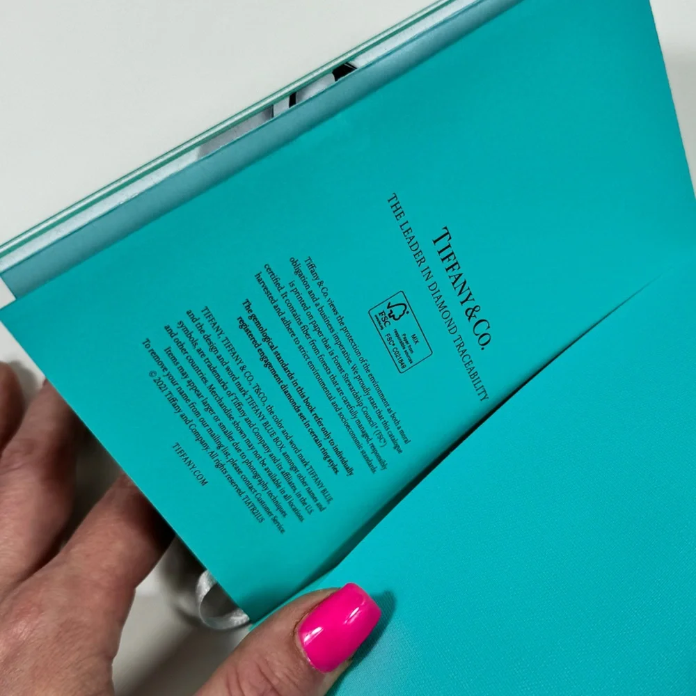 Tiffany & Co. Teal Book with Black Text